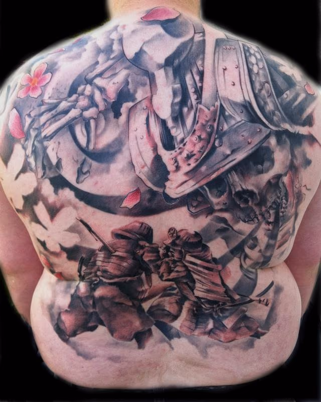 Black and Grey Skull Backpiece Tattoo