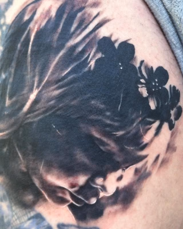 Black and Grey Portrait Tattoo