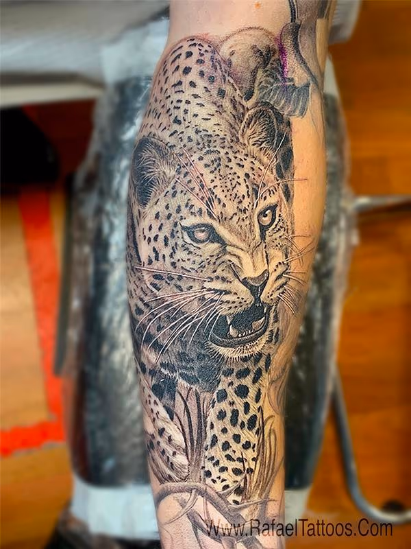 Black and Grey Leopard Portrait Tattoo