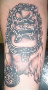 Custom black and gray tattoo