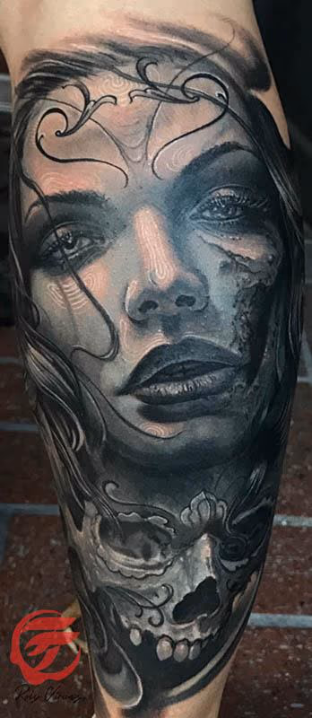 Day of the dead woman tattoo with skull in black and grey
