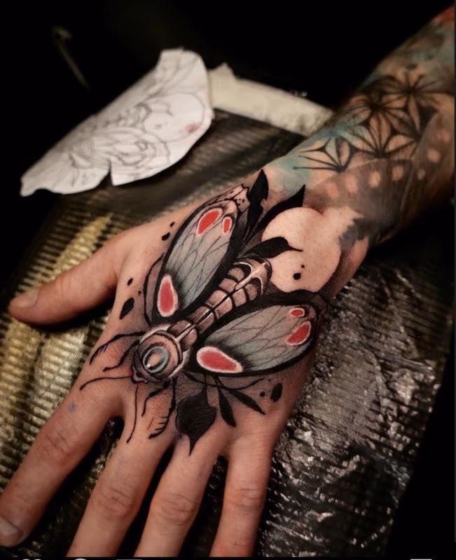 Fly Hand Tattoo