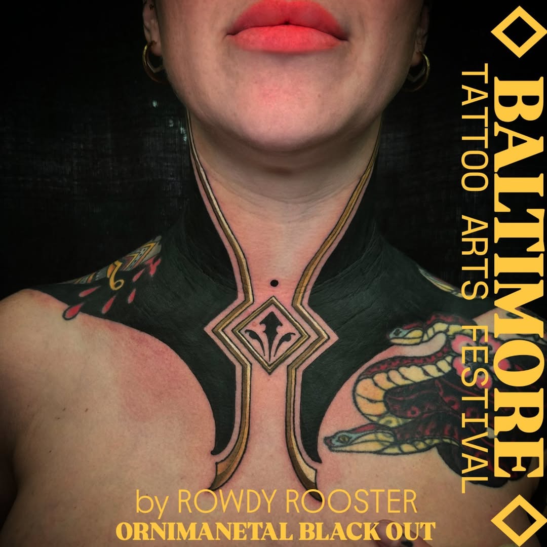 Ornamental blackout neck tattoo with gold trim