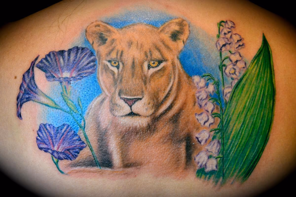 Lioness & Flowers