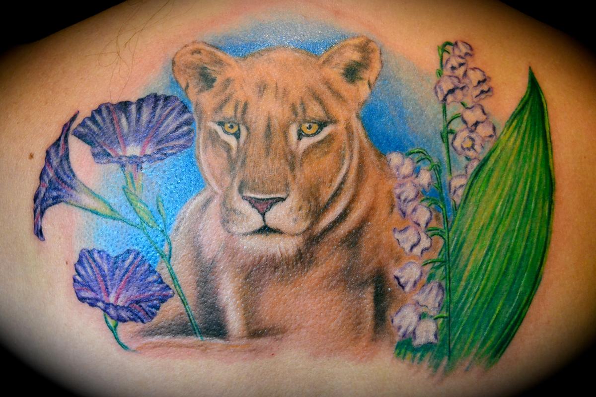 Lioness & Flowers