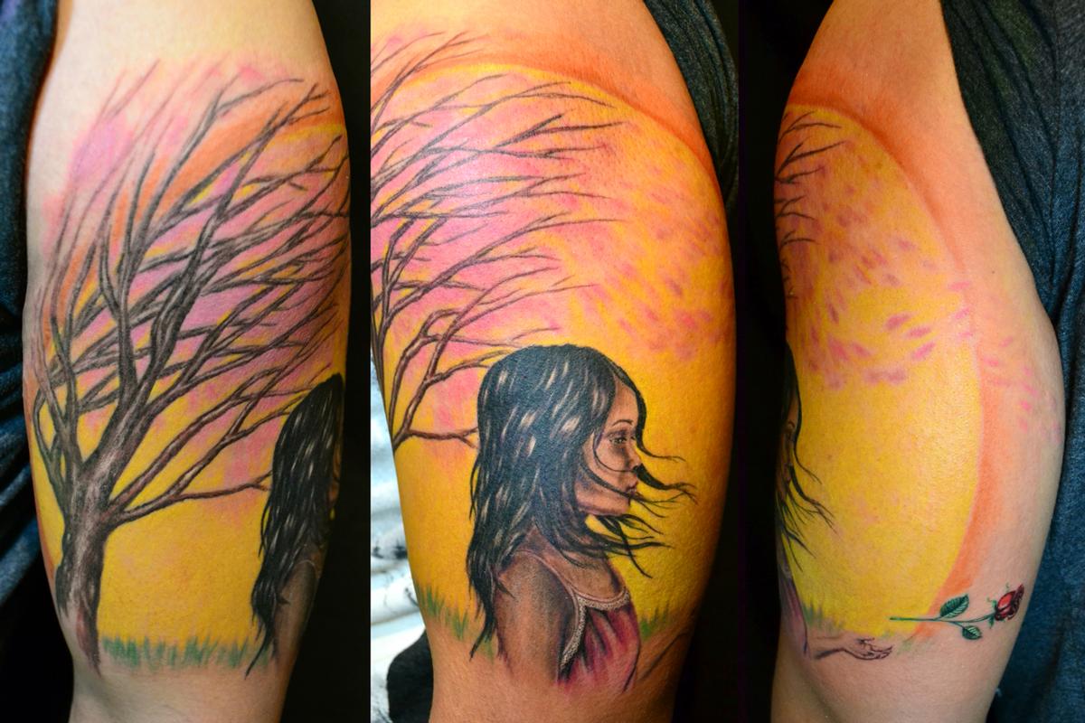 Asian Girl in the Wind with Cherry Blossom Tree and Sun letting go of rose