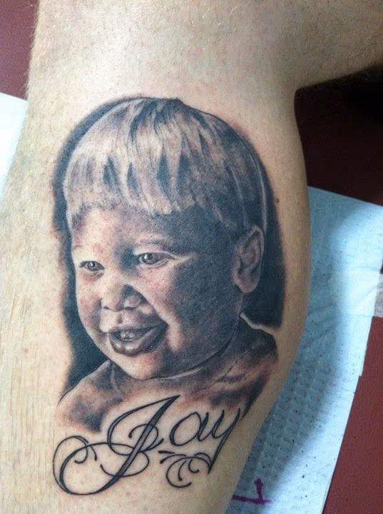 Black and Grey Portrait Tattoo