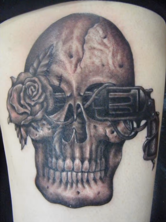 Skull Flowergun tattoo