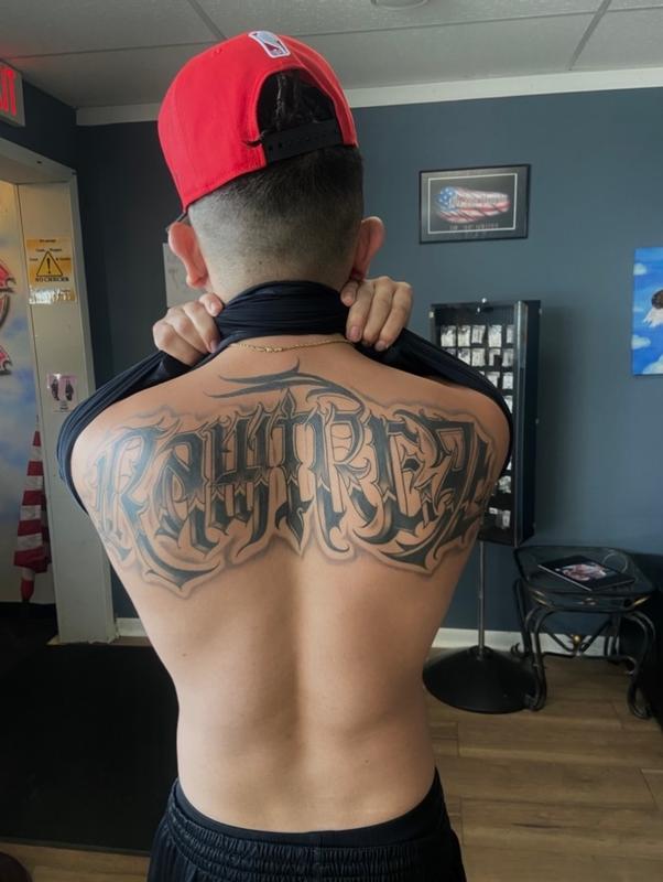 Black and grey script back piece