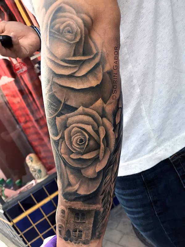 realistic black and gray girl face w/bandana, roses, and Sonoma City Hall building tatoo sleeve