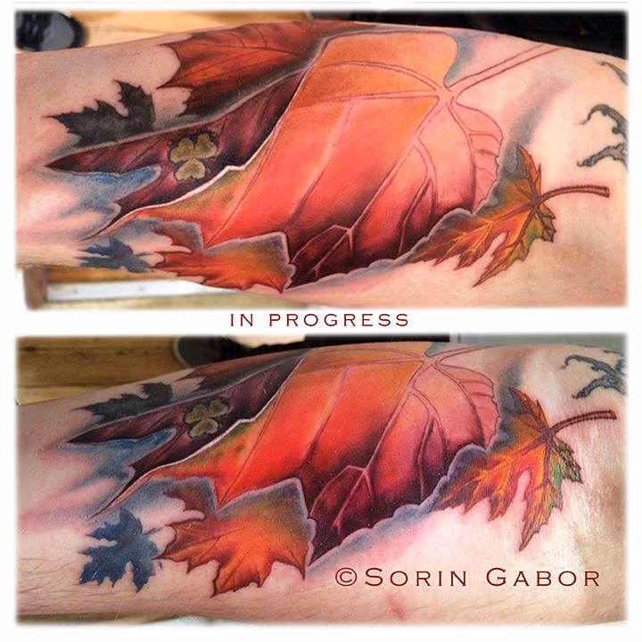 Realistic color fall leaves tattoo