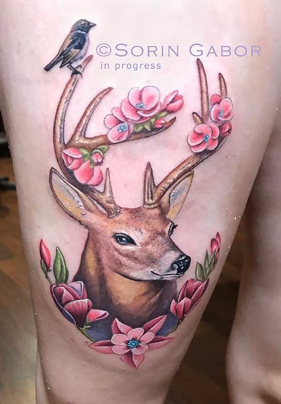 whimsical realistic color deer tattoo with flower accents