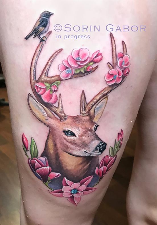 whimsical realistic color deer tattoo with flower accents