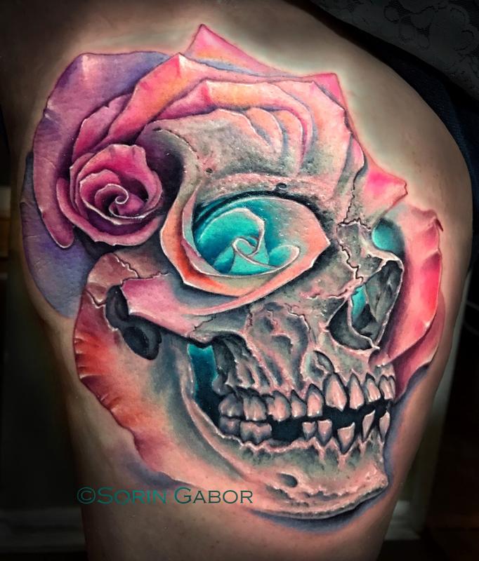 realistic color skull and multiple rose morph tattoo