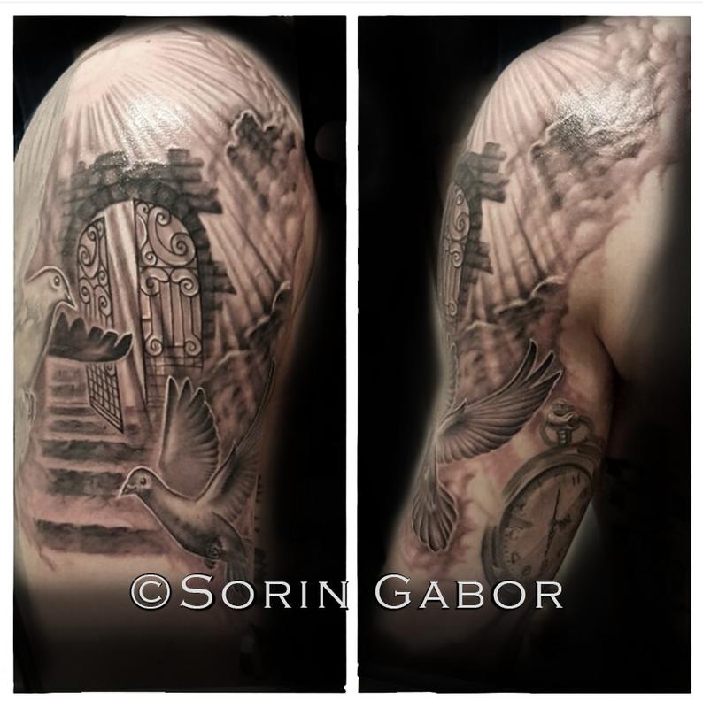Realistic black and gray doves, gate, rays, and clouds tattoo