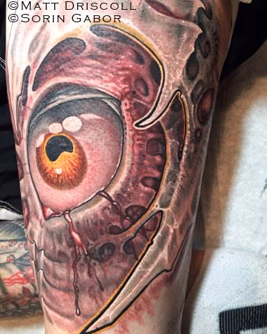 Collaborative bio mech bio organic color tattoo