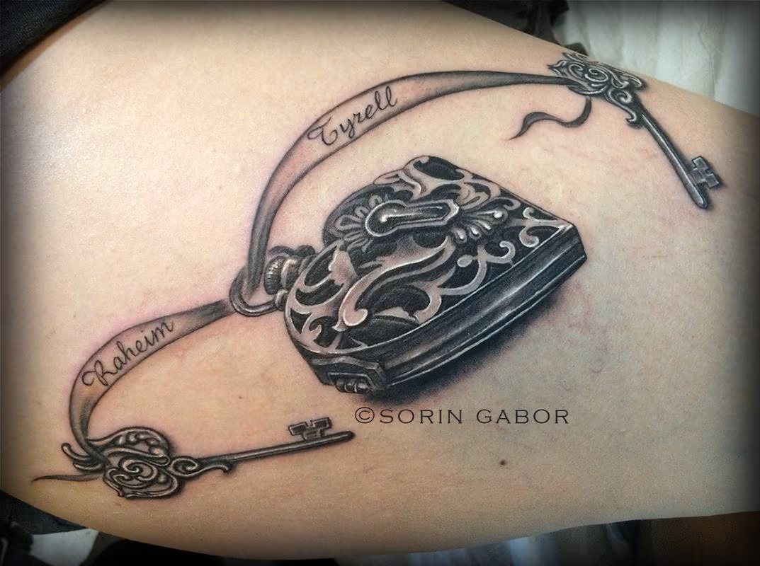 Realistic black and gray locket and keys tattoo