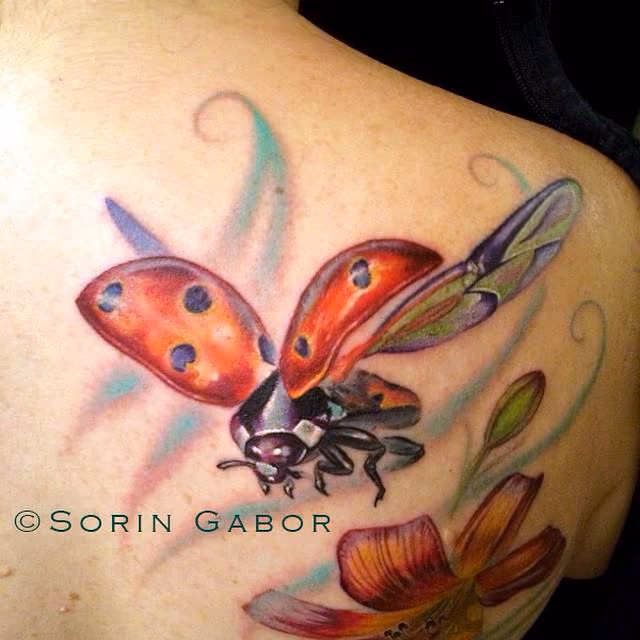 Realistic color flower and ladybug tattoo-ladybug detail
