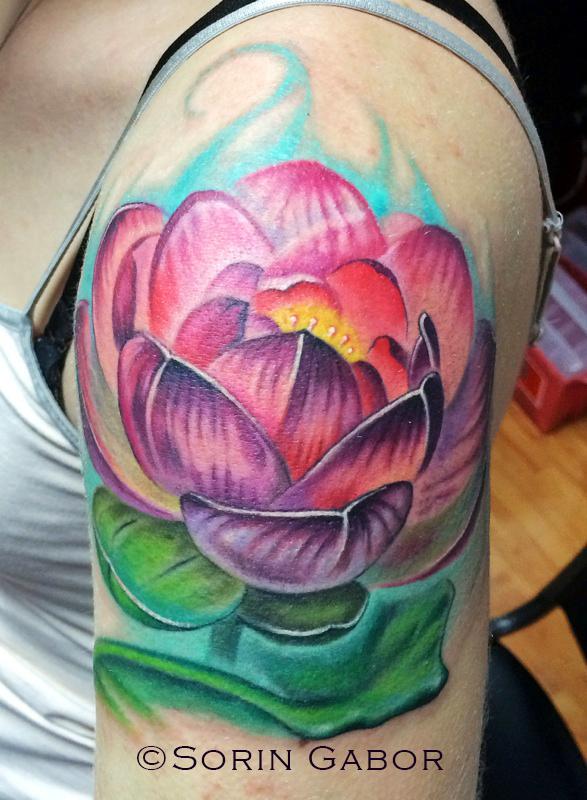 realistic color lotus tattoo on shoulder