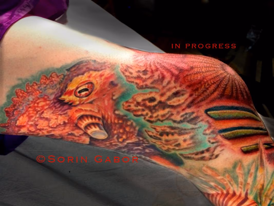 Red bio organic and realistic octopus and sealife tattoo leg sleeve