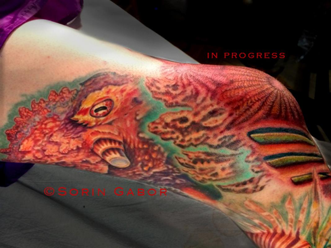 Red bio organic and realistic octopus and sealife tattoo leg sleeve