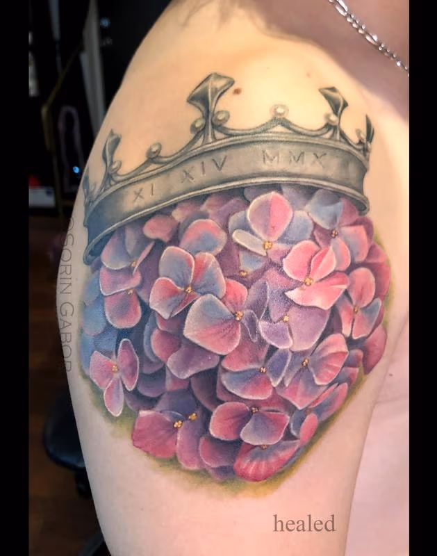 Realistic color hydrangea and crown tattoo