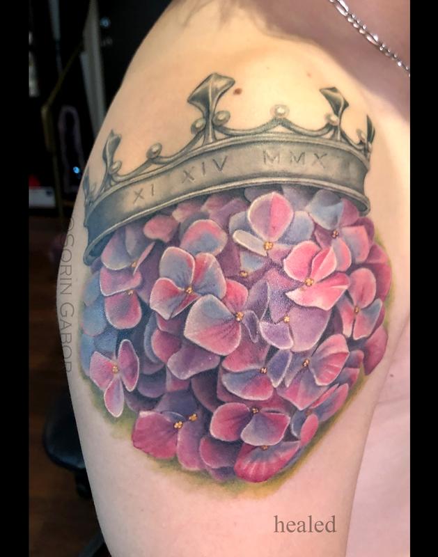 Realistic color hydrangea and crown tattoo