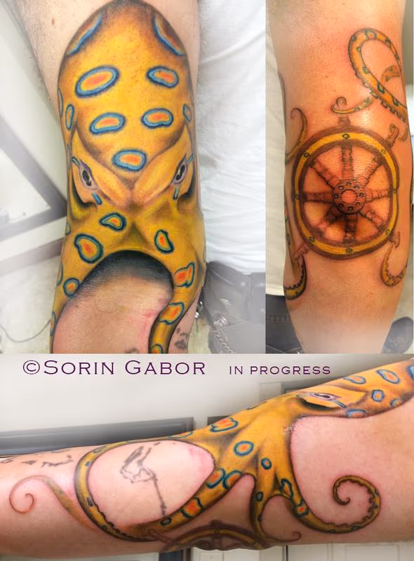 Realistic color blue ring octopus tattoo with ship wheel
