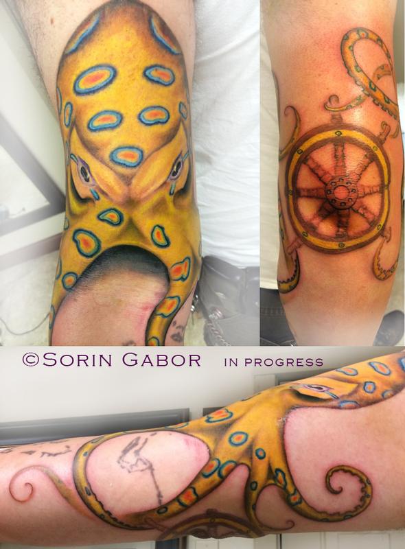 Realistic color blue ring octopus tattoo with ship wheel