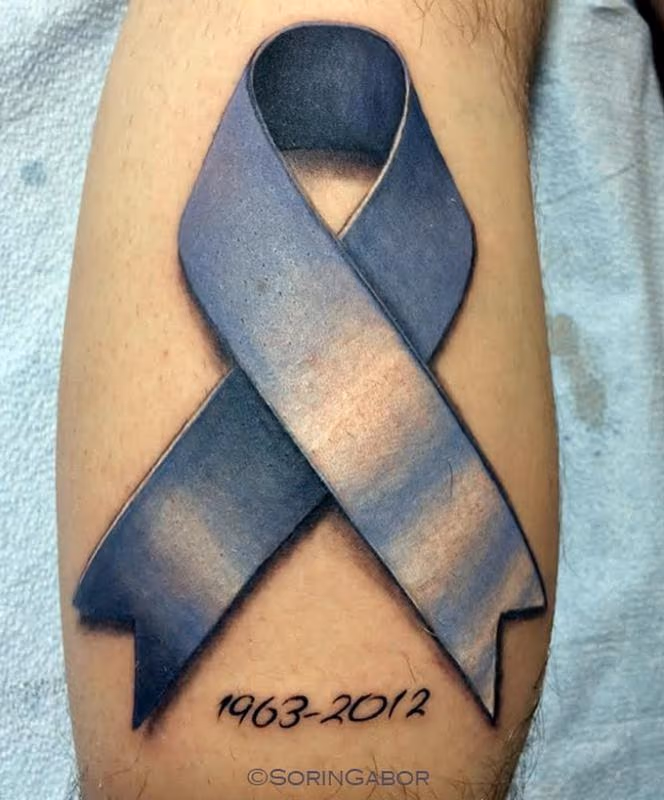 realistic color cancer ribbon tattoo