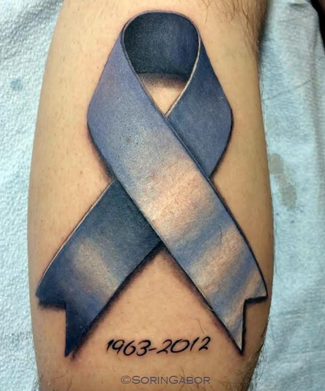 realistic color cancer ribbon tattoo