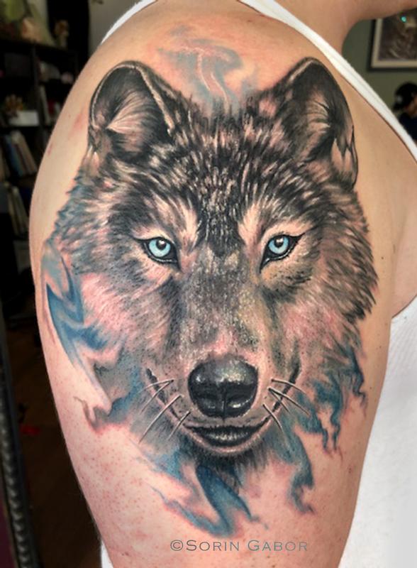 Realistic color watercolor wolf tattoo