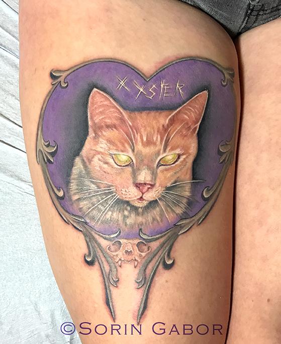 realistic color cat portrait memorial tattoo with frame embellishments and skull