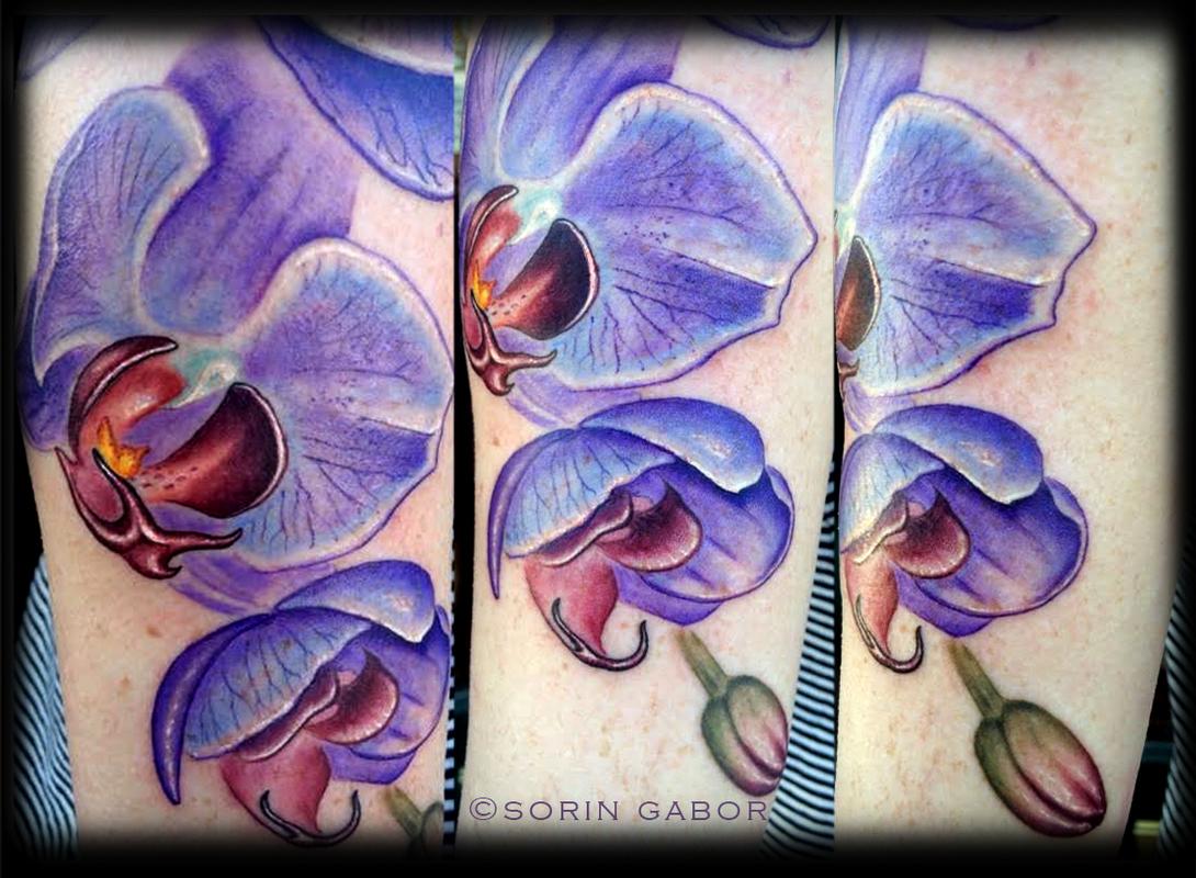 Realistic color purple orchid and orchid mantis tattoo in progress