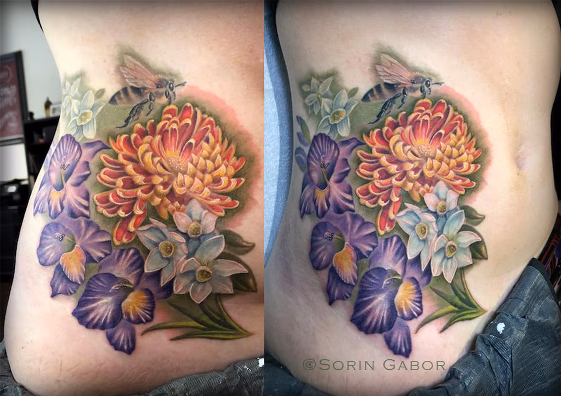 Realistic color flowers and bee tattoo
