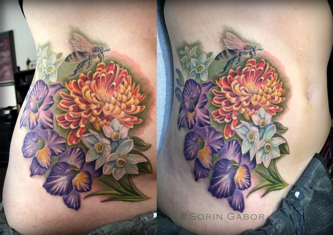 Realistic color flowers and bee tattoo