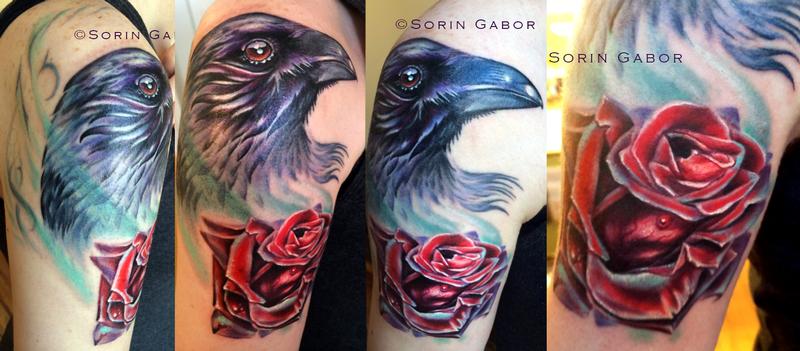 Realistc color raven and rose tattoo on shoulder