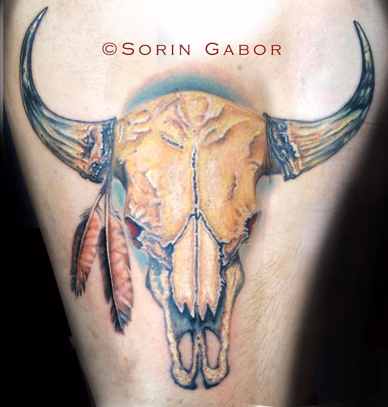 Realistic color bull skull tattoo on forearm