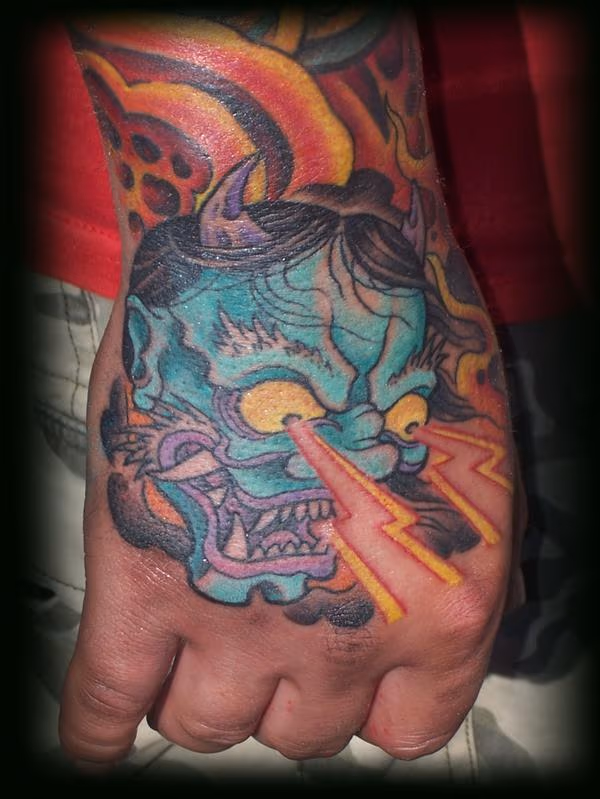 Demon hand tattoo