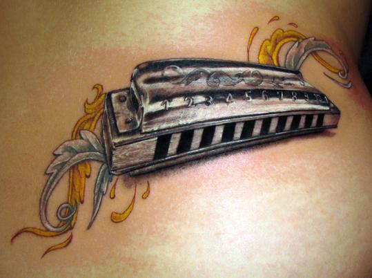 Harmonica tattoo