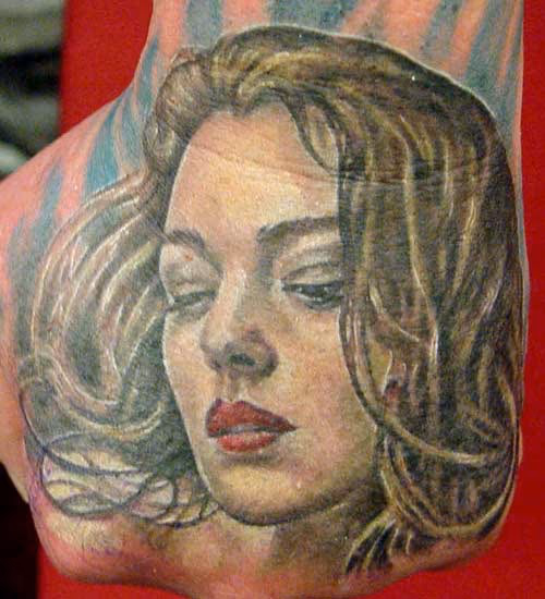 Woman's Face on hand