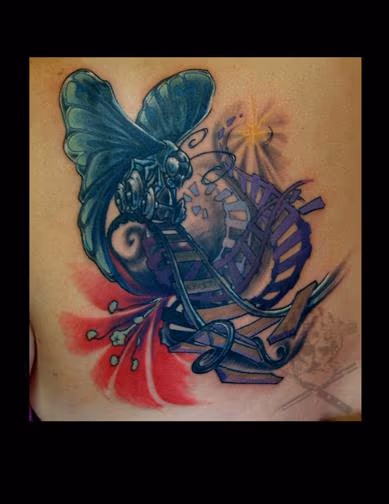 Butterfly Locomotive on Train tracks with Flower Tattoo