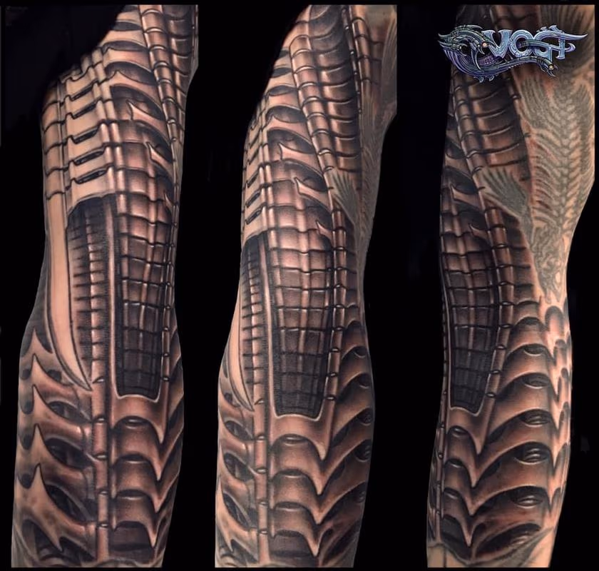 Black and Grey Giger inspired tattoo sleeve