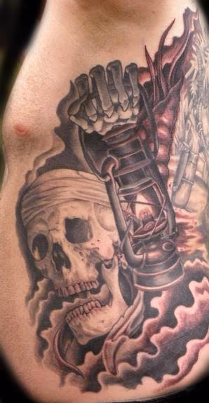 black and gray skull with lantern