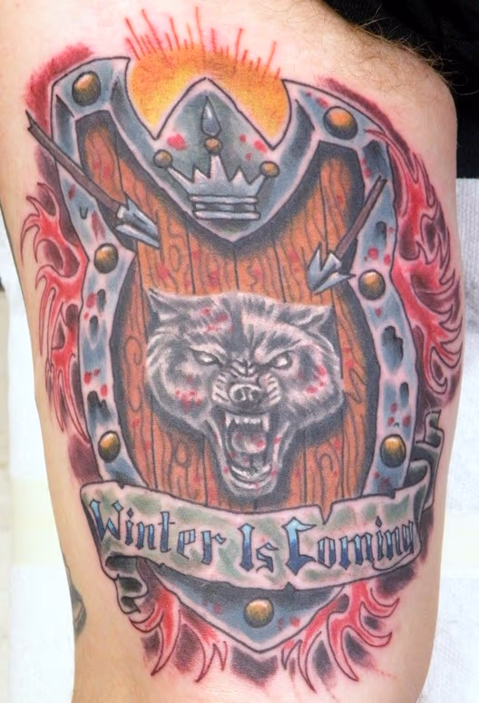 R.R. Martin tat, with wolf and shield