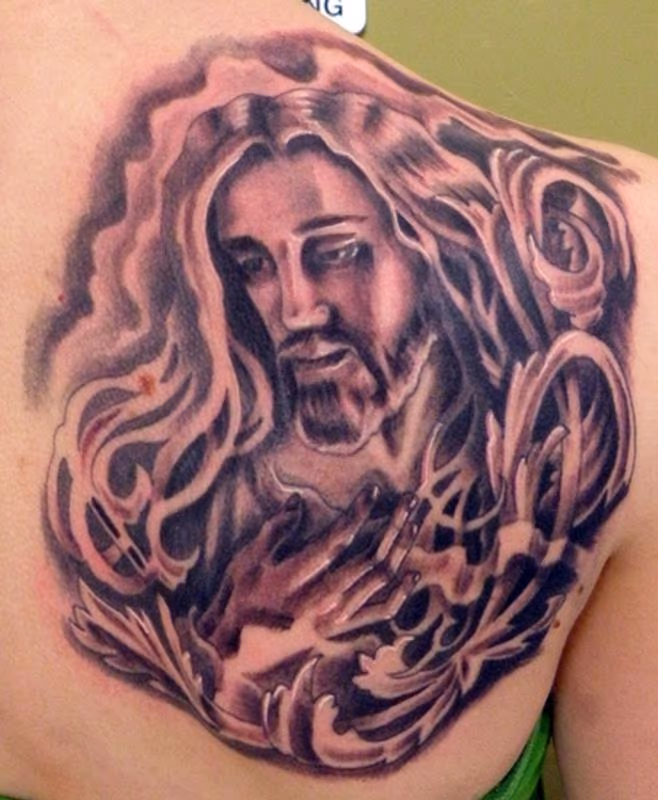 black and gray jesus tattoo with filigree