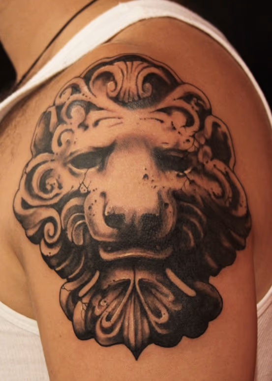 Lion Statue Tattoo