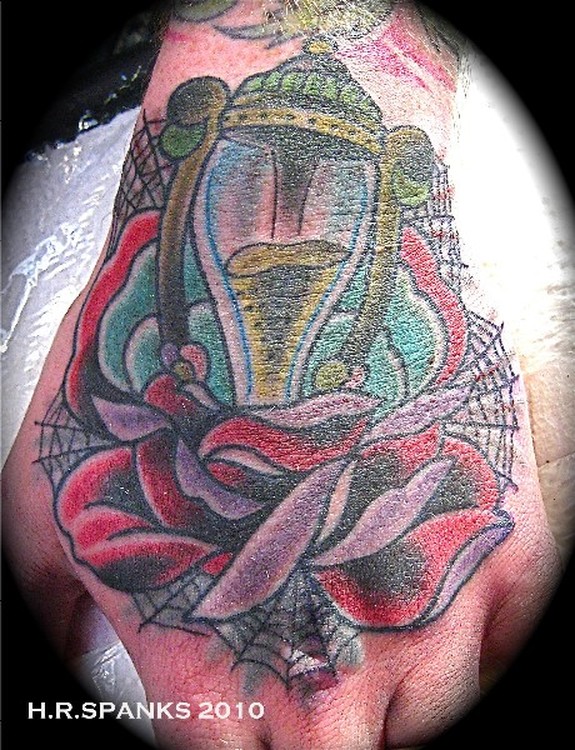 Rose hand tattoo