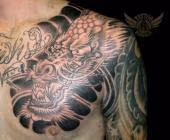 Black and gray dragon tattoo