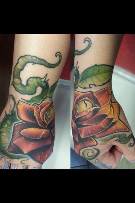 Real School rose and lizard eye by Matt Driscoll